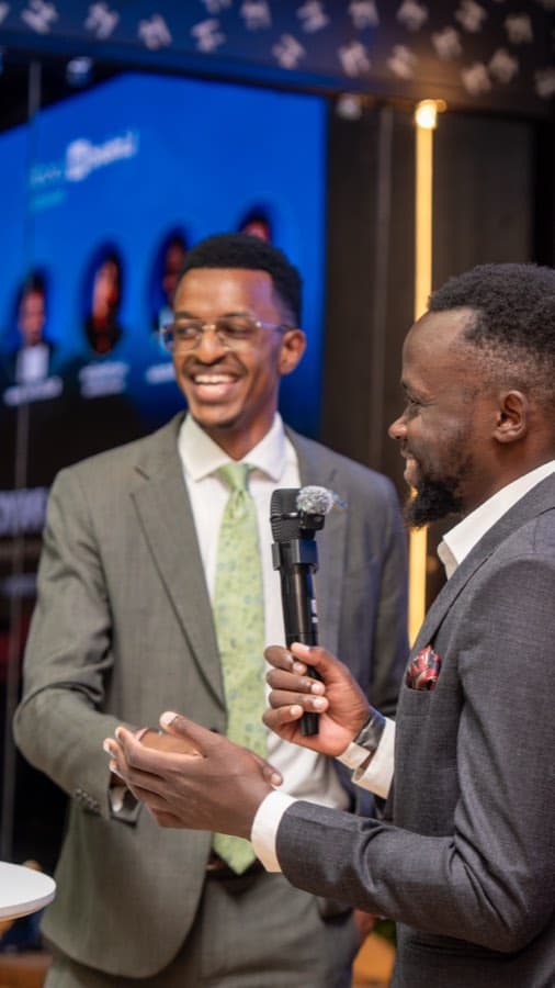 Magothe Innocent with a guest at LinkedIn Local Nairobi